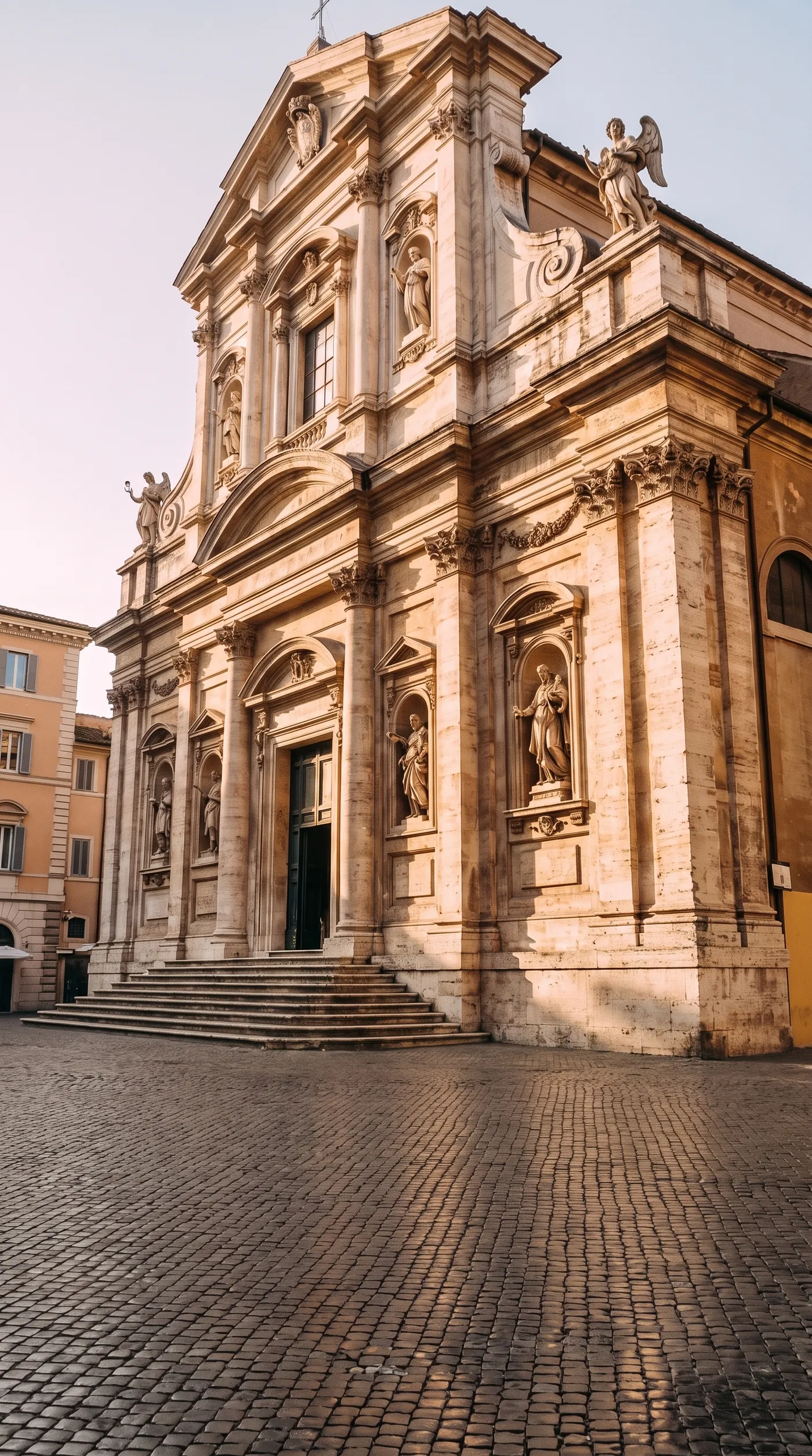 After: the same Roman church on an empty piazza, with the crowd, stand, scooter and barriers removed by Background cleanup on getimg.ai