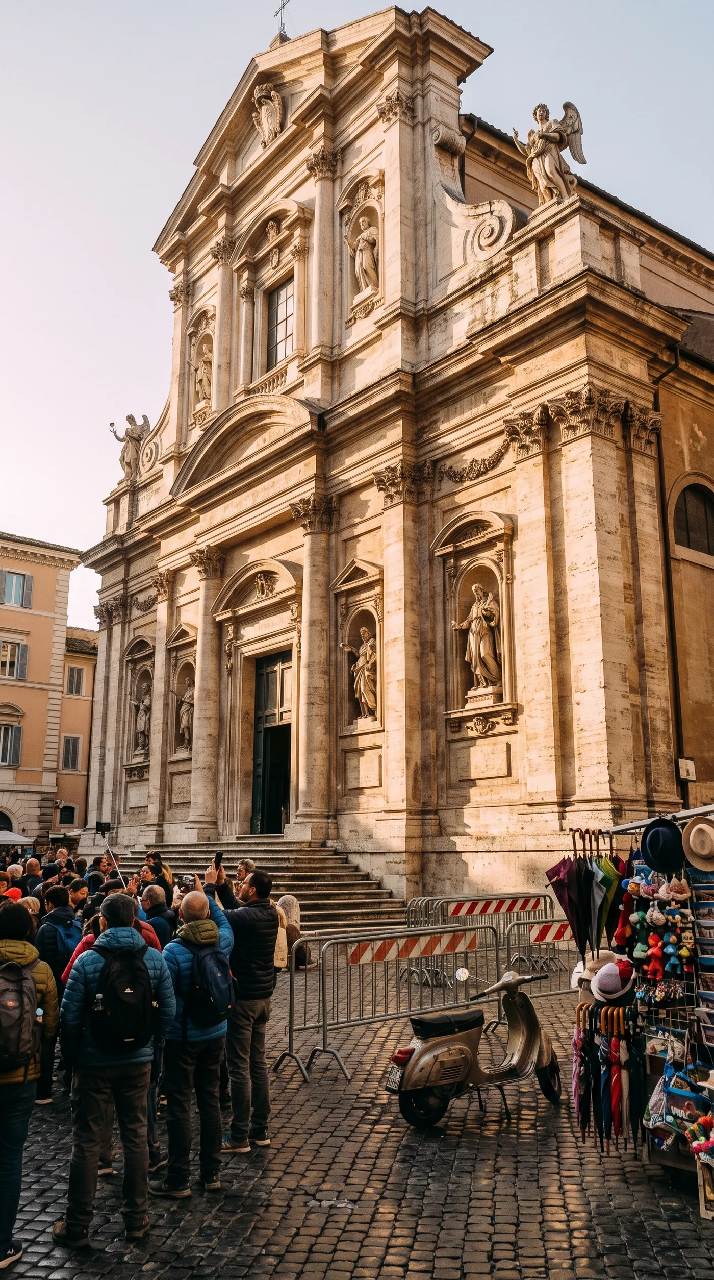 Before: a baroque church facade in Rome hidden behind a tour group, a souvenir stand, a scooter and barriers, used as a background cleanup example on getimg.ai