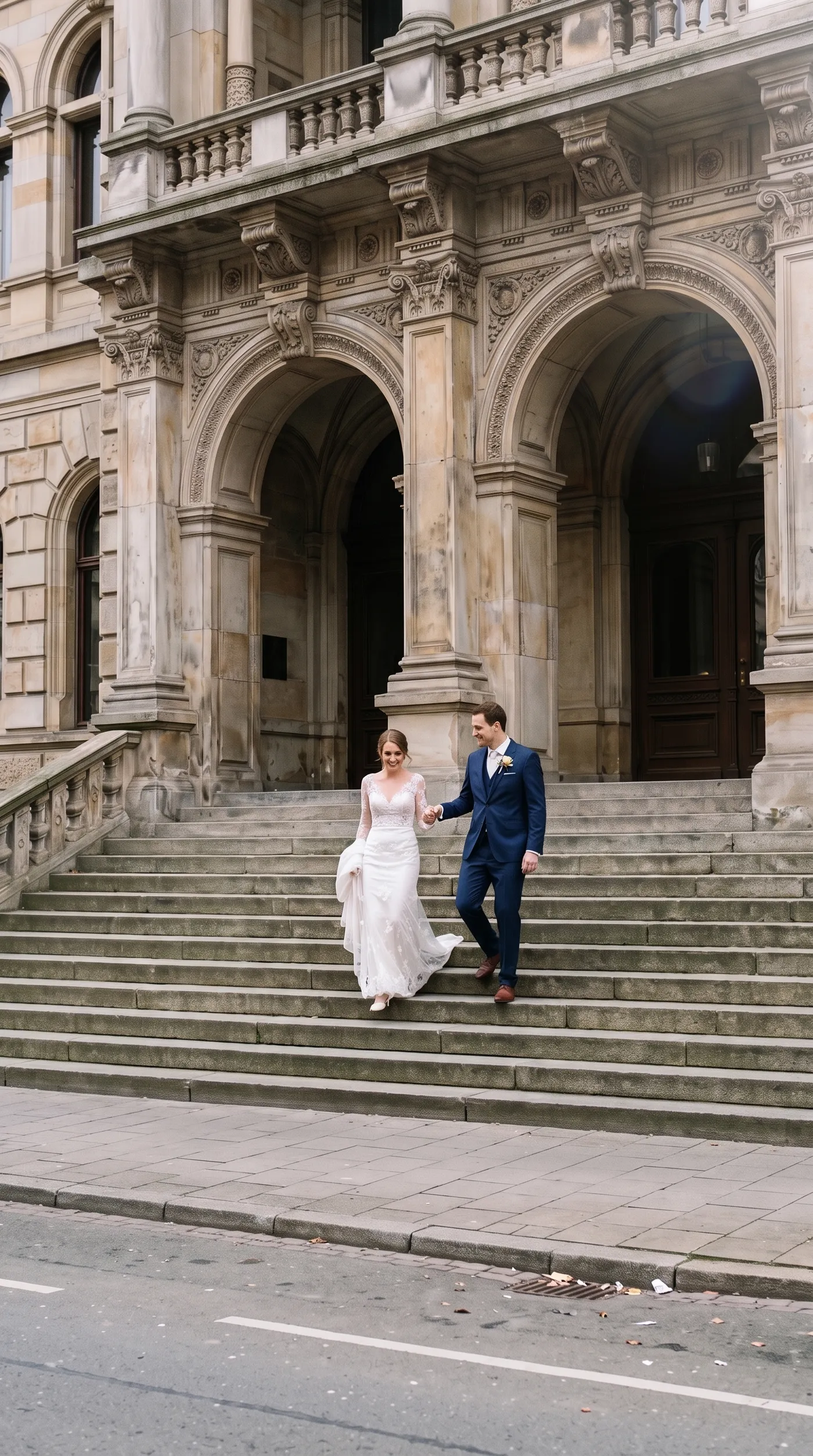 After: the same wedding photo with the car, passers-by, barrier and bin removed by Background cleanup on getimg.ai
