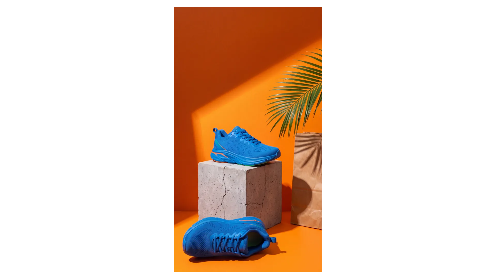 The same sneaker product visual recomposed at 9:16 vertical proportions on a transparent wide canvas, adapted with Smart Resize in getimg.ai