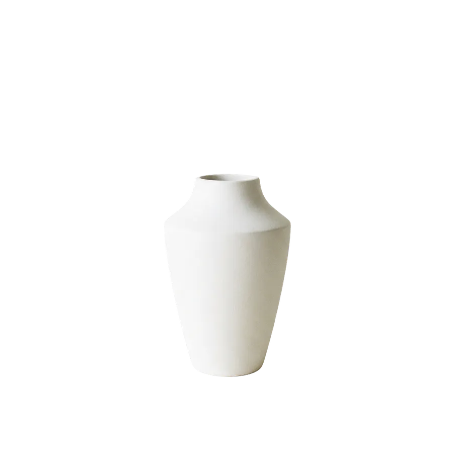 The same white vase isolated on a transparent background with the near-identical off-white table and wall removed, background removed with getimg.ai