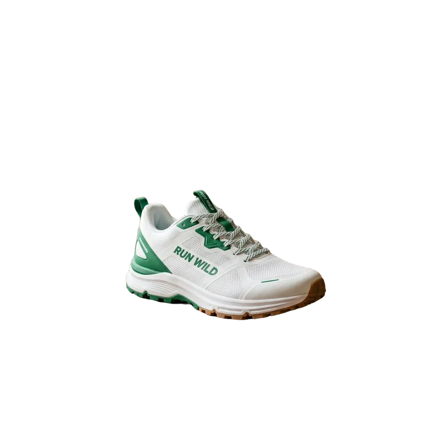 White and green running sneaker cut out from a cluttered workbench photo onto a transparent background, generated and cut out with getimg.ai