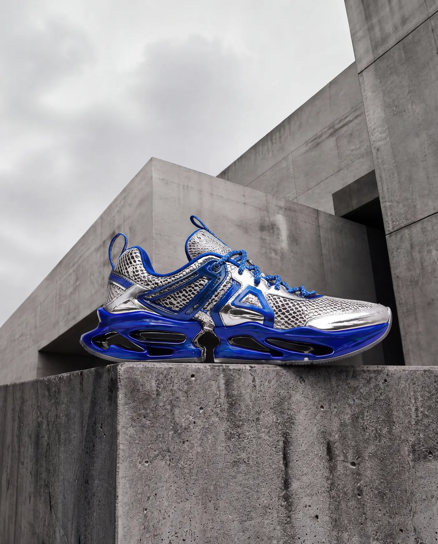 blue and silver luxury sneaker on a brutalist background, generated with getimg.ai