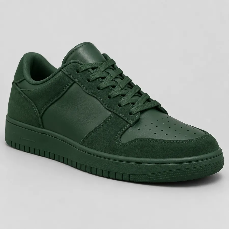 Same sneaker shape in a monochrome forest-green colorway with tonal overlays and sole