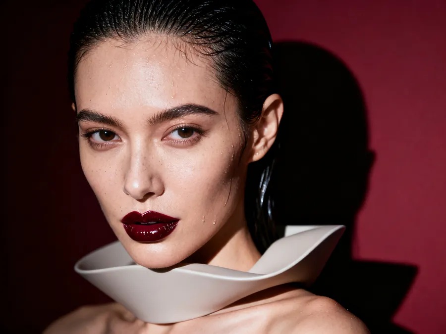 Editorial fashion portrait under hard studio light