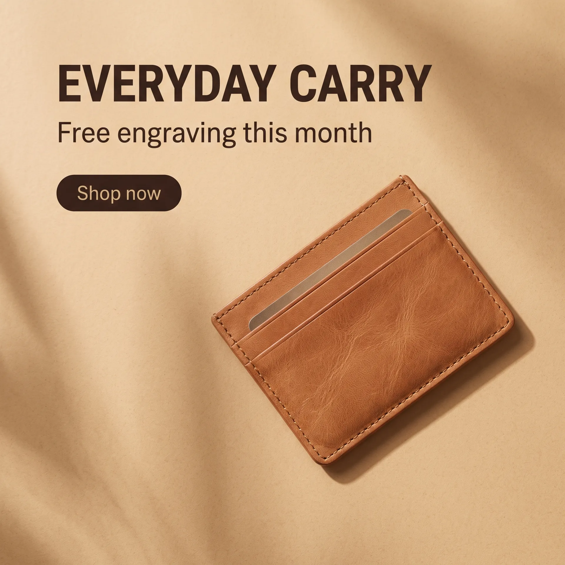Square social ad with the headline EVERYDAY CARRY, the line Free engraving this month, a Shop now button and a tan leather card wallet on a warm sand background. Ad creative generated in getimg.ai.