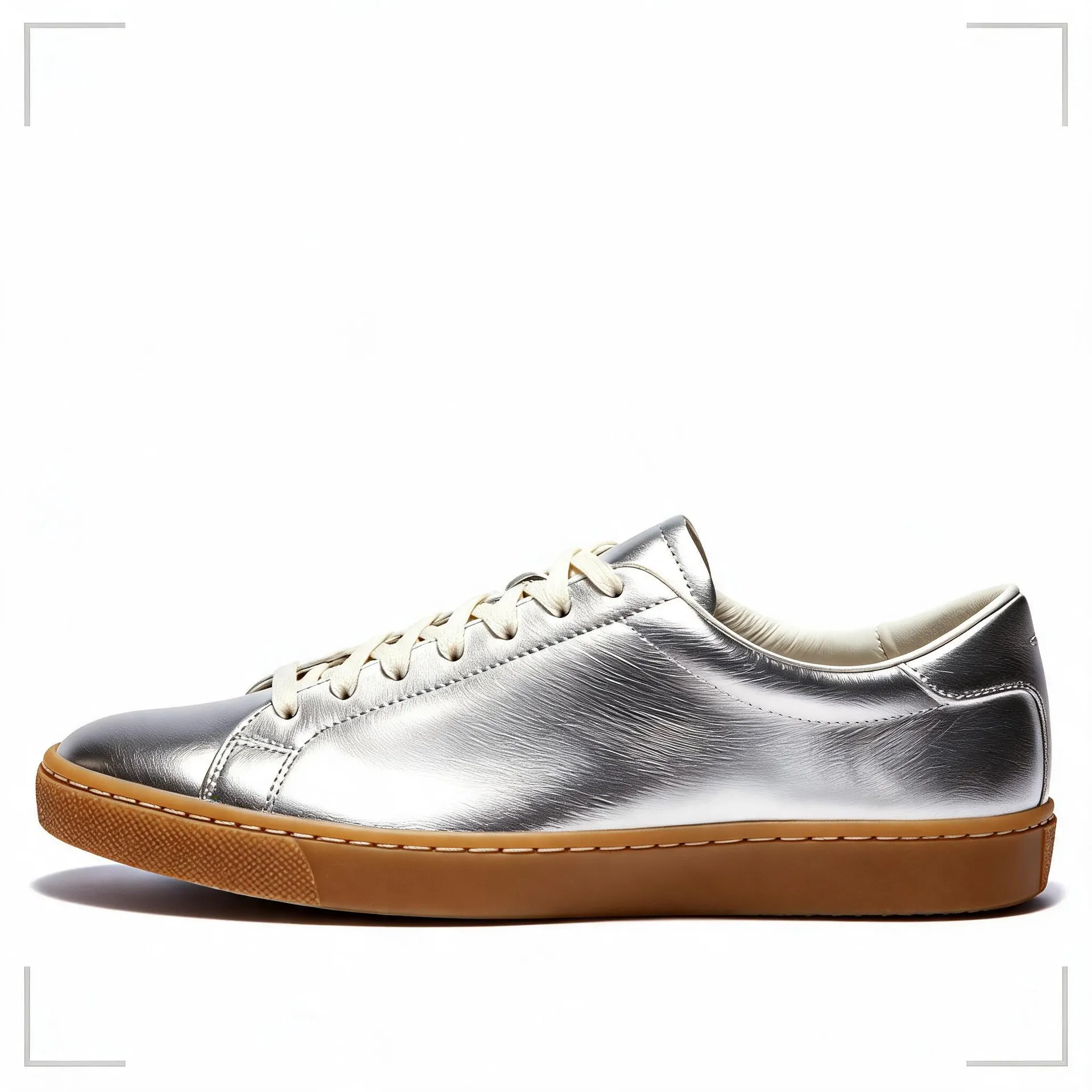 The same sneaker rendered as a design concept with a brushed metallic silver upper instead of white leather. Material concept generated in getimg.ai.