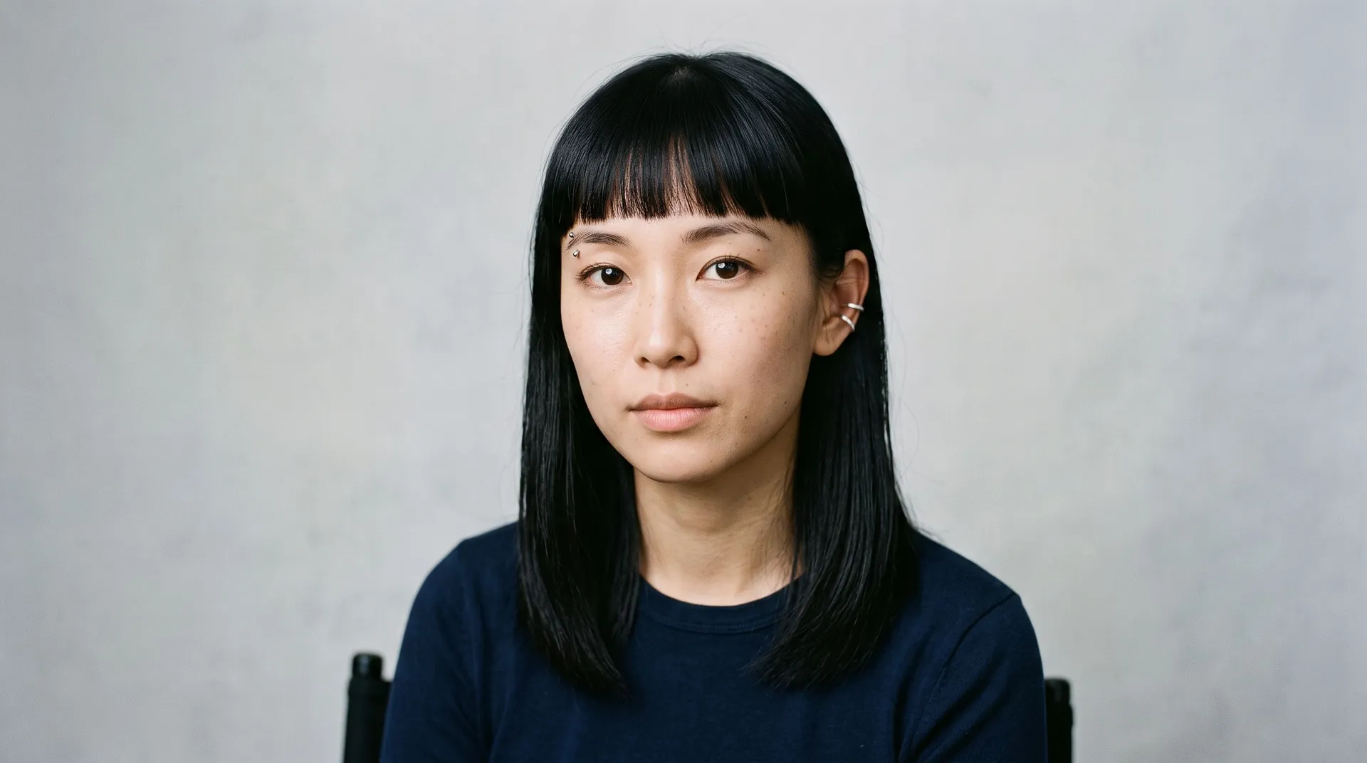 portrait photo of an asian woman with straight long black hair and bangs, source image for hairstyle modification on getimg.ai